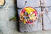 Breakfast Bowl with mango and iced berries