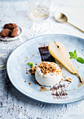 Coconut and vanilla Blanc-Manger, poached pear and speculoos crumbs