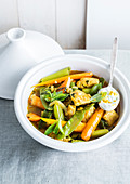 Chicken tagine with celery, carrots and sugar snap peas