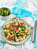 Gnocchis, small clams, asparagus ad cherry tomato salad