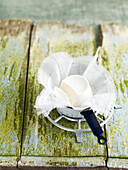 Drain the ricotta in cheesecloth over a sieve