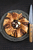 Easter sponge roulade wreath with chocolate eggs