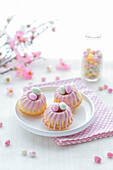 Easter mini bundt cake with pink icing and Easter eggs