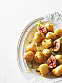 Deep-fried Greek fritters with figs