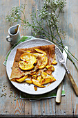 Crêpe with apple, caramel and fennel seeds