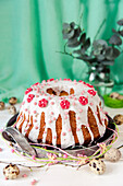 Polish Easter baba with icing and sugar flowers