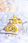 Sponge cake roll with exotic fruits (Christmas)