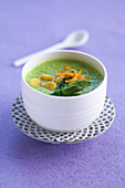 Cream of asparagus soup with orange zest