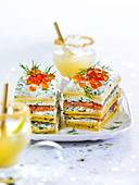 Mille feuille with salmon, herb cream and caviar (Christmas food)