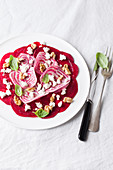 Beetroot carpaccio with fresh goat's cheese and walnuts