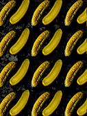Gherkins on a black background (full picture)