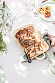Pork ribs with thyme on a summer outdoor table