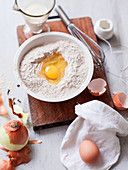 Preparing Kig ha farz: mixing eggs and buckwheat flour