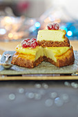 Cheesecake garnished with glazed redcurrants