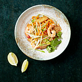 Carrot spaghetti noodle salad with prawns and grilled tofu