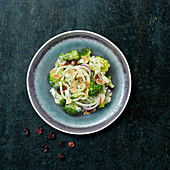 Broccoli with celery spaghetti and roasted almond flakes