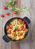 Spaghetti with meatballs and cherry tomatoes
