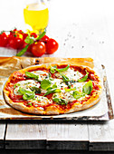 Pizza with tomatoes and mozzarella
