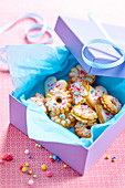 Gift box of flower-shaped decorated biscuits
