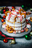 Christmas gingerbread cake with apple rings and candy canes