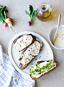 Tartines with garlic ricotta cream and spring vegetables
