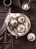 Coffee and chocolate ice cream topped with whipped cream