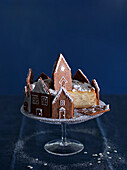 Alsatian apple pie surrounded by gingerbread houses