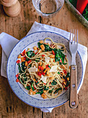 Spaghettis with spinach,peppers and parmesan