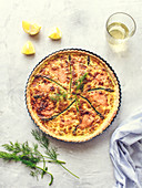 Salmon quiche with prawns and asparagus