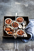 Individual pear and chocolate runny puddings