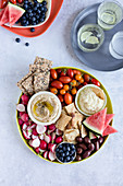 A bowl of nibbles and dips
