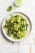 Tagliatelle with summer green vegetables, pesto sauce