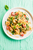 Spaghetti with shrimps, spinach and garlic sauce