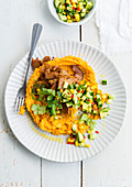 Meat with sweet potato purée and salsa salad