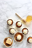 Honey cupcakes with cream topping