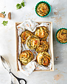 Savory puff pastry snails with herbs