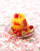 Brawn with red berries and grapes