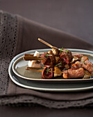 Grilled kidneys on a skewer