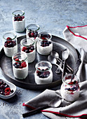 Chia pudding with red fruits served in glasses