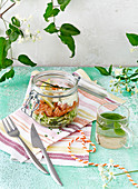 Salmon tartare with zucchini in jar