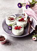 Soy yoghurt with chocolate shavings and raspberries