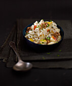 Rice salad with apple and walnuts
