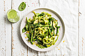Ribbon noodles with green summer vegetables