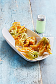 Tempura of zucchini flowers