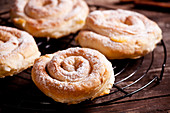 Pastry snails with cream filling