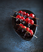 Fruit skewers with chocolate-covered strawberries