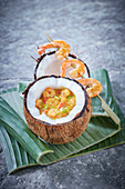 Prawn coconut curry served in coconut