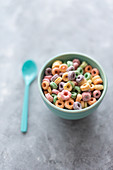 Bowl of multicolored cereals