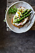 Green asparagus and quail egg crostini