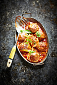 Meatballs with onions and tomato sauce